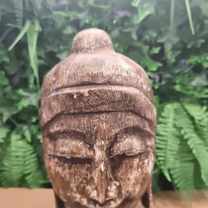 Tête de Bouddha stylisée sur socle